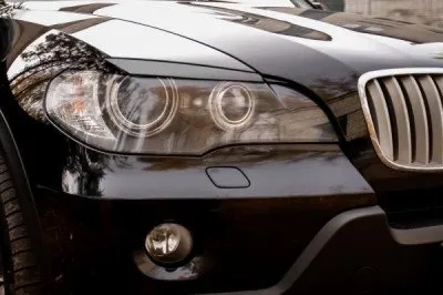 Реснички на фары под покраску для BMW X5 2006-2010 (REBX5-006500)