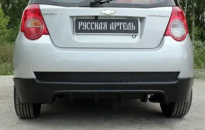 Накладка на задний бампер АБС-пластик для Chevrolet Aveo Хетчбэк (3 дв) 2006-2012, Aveo Хетчбэк (5 д (TOCA-020400)
